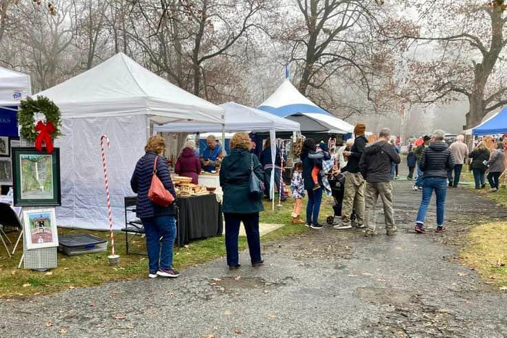 people shopping at Chistkindlmarkat in Coleman Memorial Park
