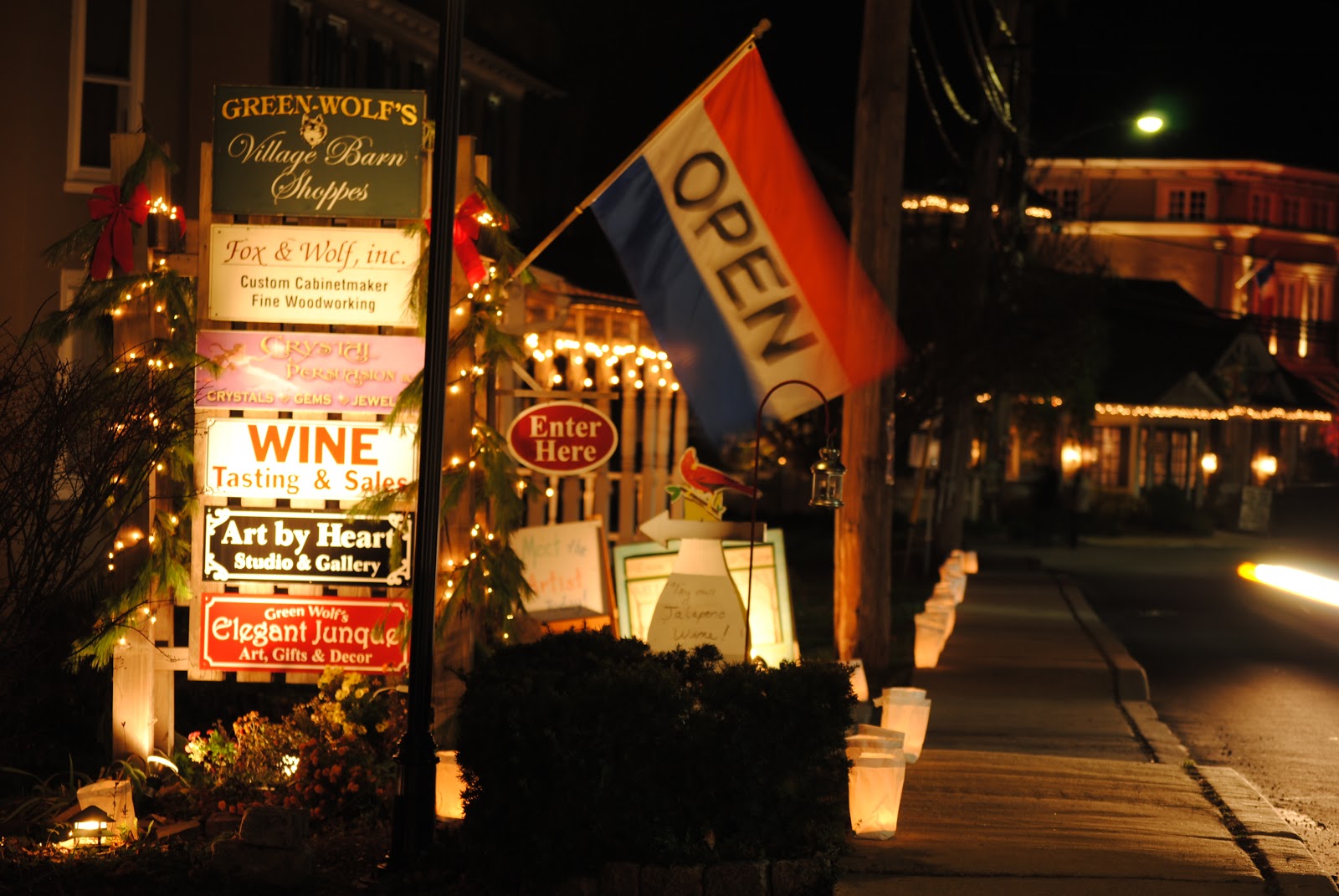 Skippack village business signage board with Open Flag