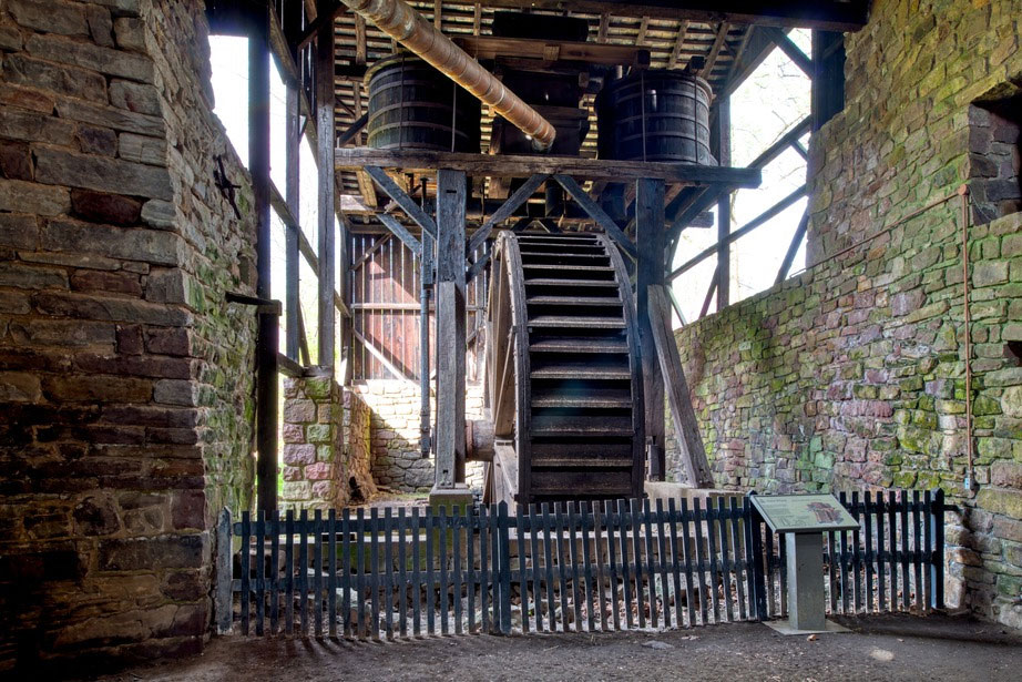 Giant wooden wheel at Hopewell Furnace