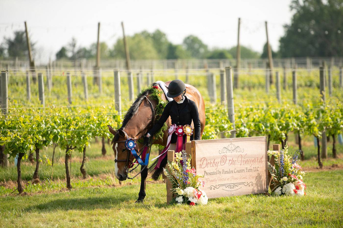 A Winner Jockey and horse presented with gift at the vineyard derby