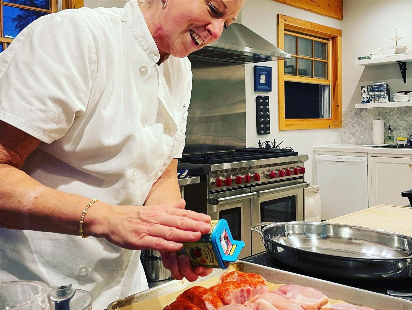 a chef prepping meat to cook